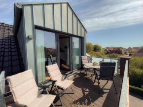 Meerzeit - Sauna und Kamin - moderne FeWo in Kellenhusen